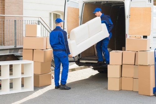 Removal team planning a Notting Hill residential move on a narrow London street