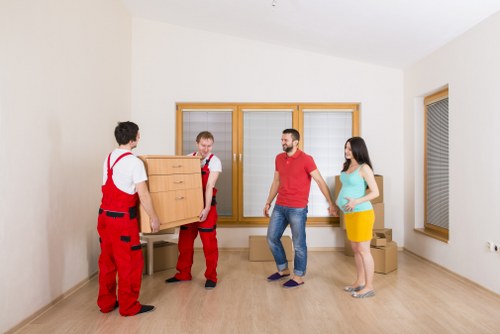 Furniture and boxes being loaded for a Notting Hill move