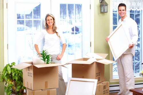 Removal van collecting household items in West London